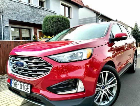 samochody osobowe Ford EDGE cena 113000 przebieg: 69900, rok produkcji 2020 z Września